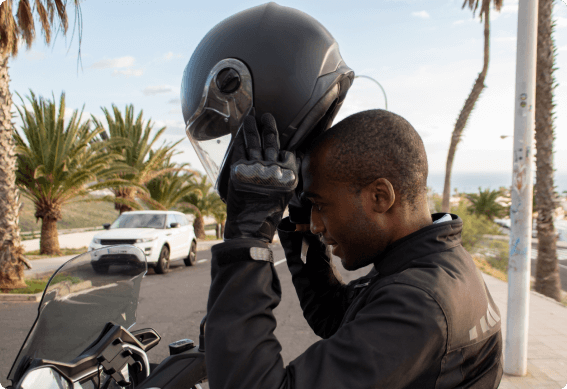 a man putting on a helmet