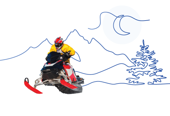 a man riding a snowmobile