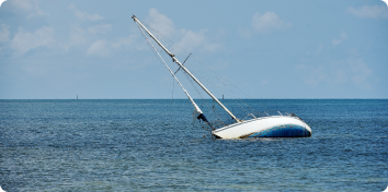 a partially sunk sailboat