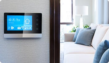 A smart home device mounted on a wall