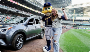 Air National Guard Senior Airman Abygail (Abby) Boyle with Brewers mascot