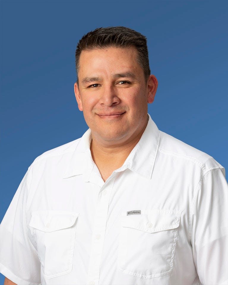a man wearing a white shirt