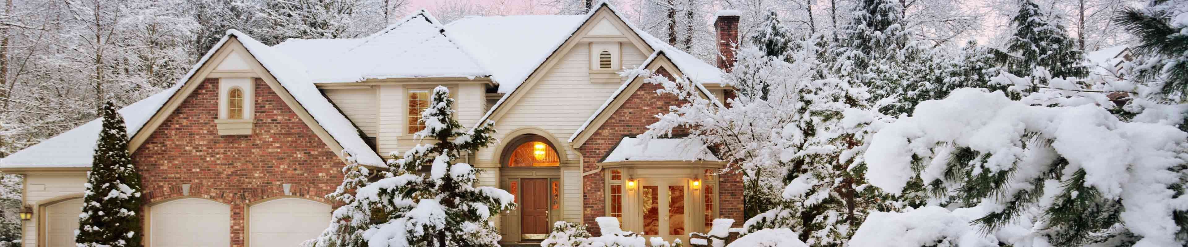 A home with snow on the roof.