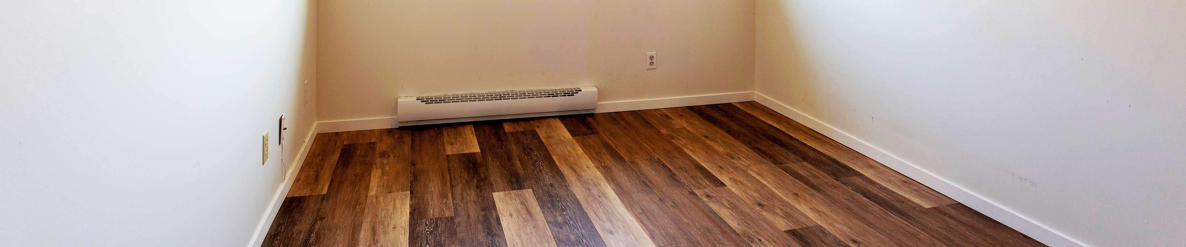 Photo of an electric baseboard heater.