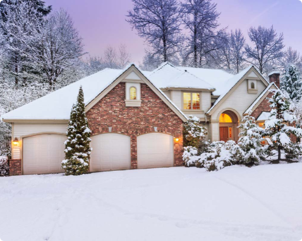 A home covered in snow during winter