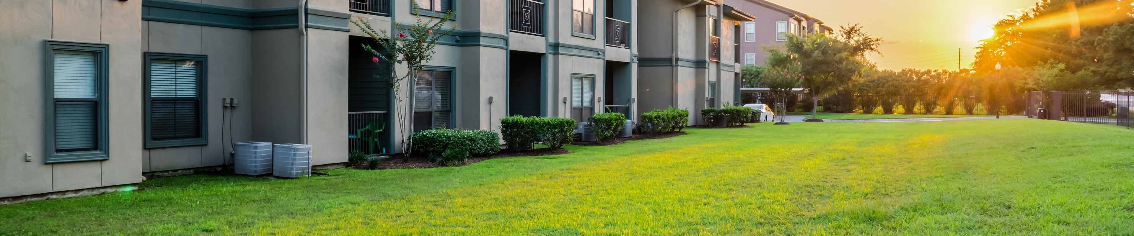 Row of condos and common area lawn