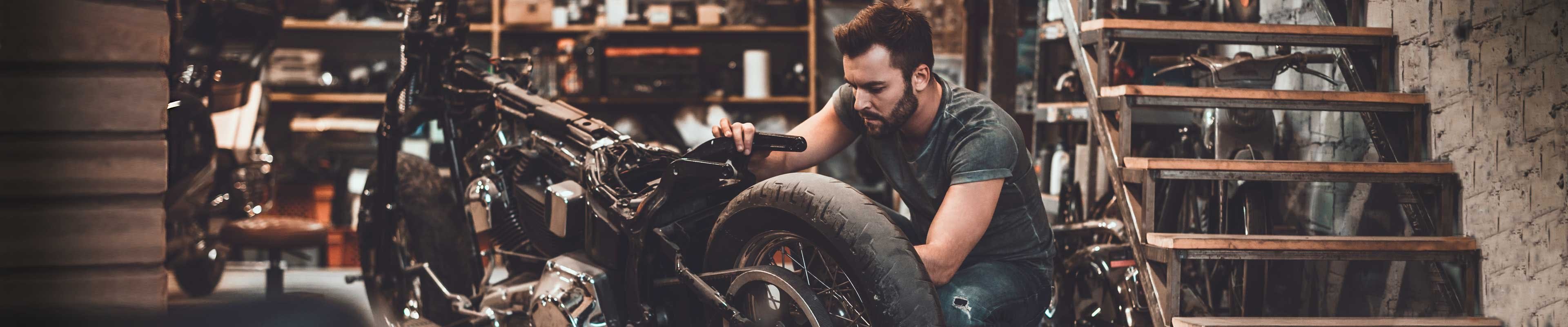 Man working on his motorcycle