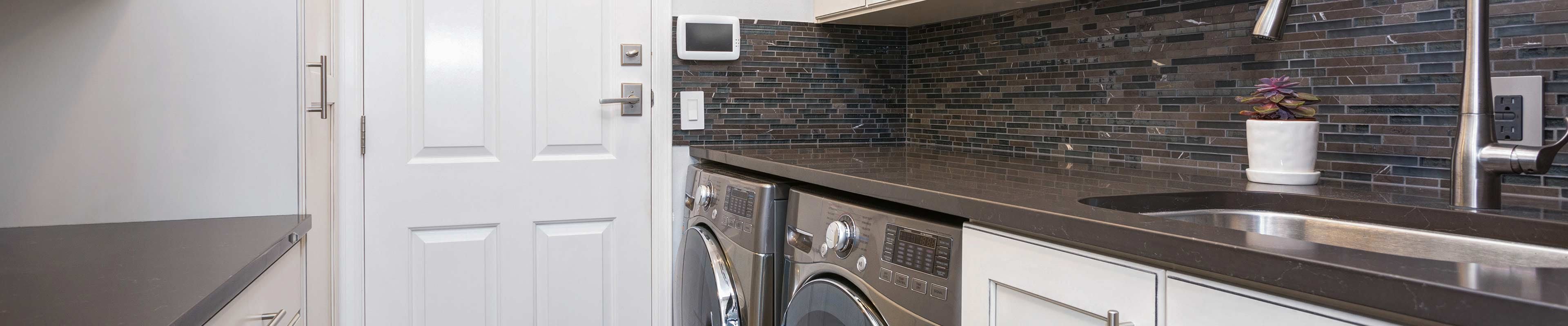 Image of an in-unit washer and dryer in a rental home.