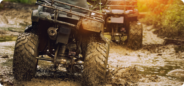 ATV in a muddy area