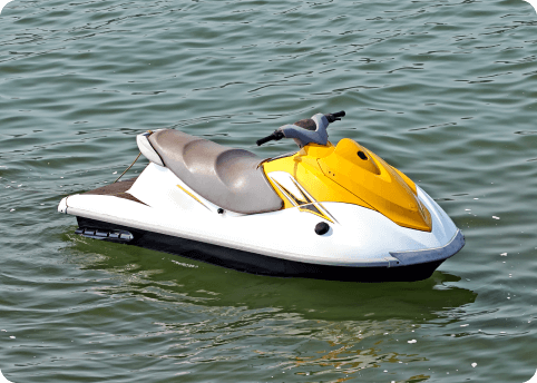 a yellow jetski floating on the water