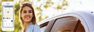 a person smiling next to a phone