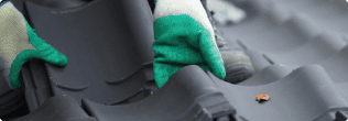 a person wearing gloves and a mask